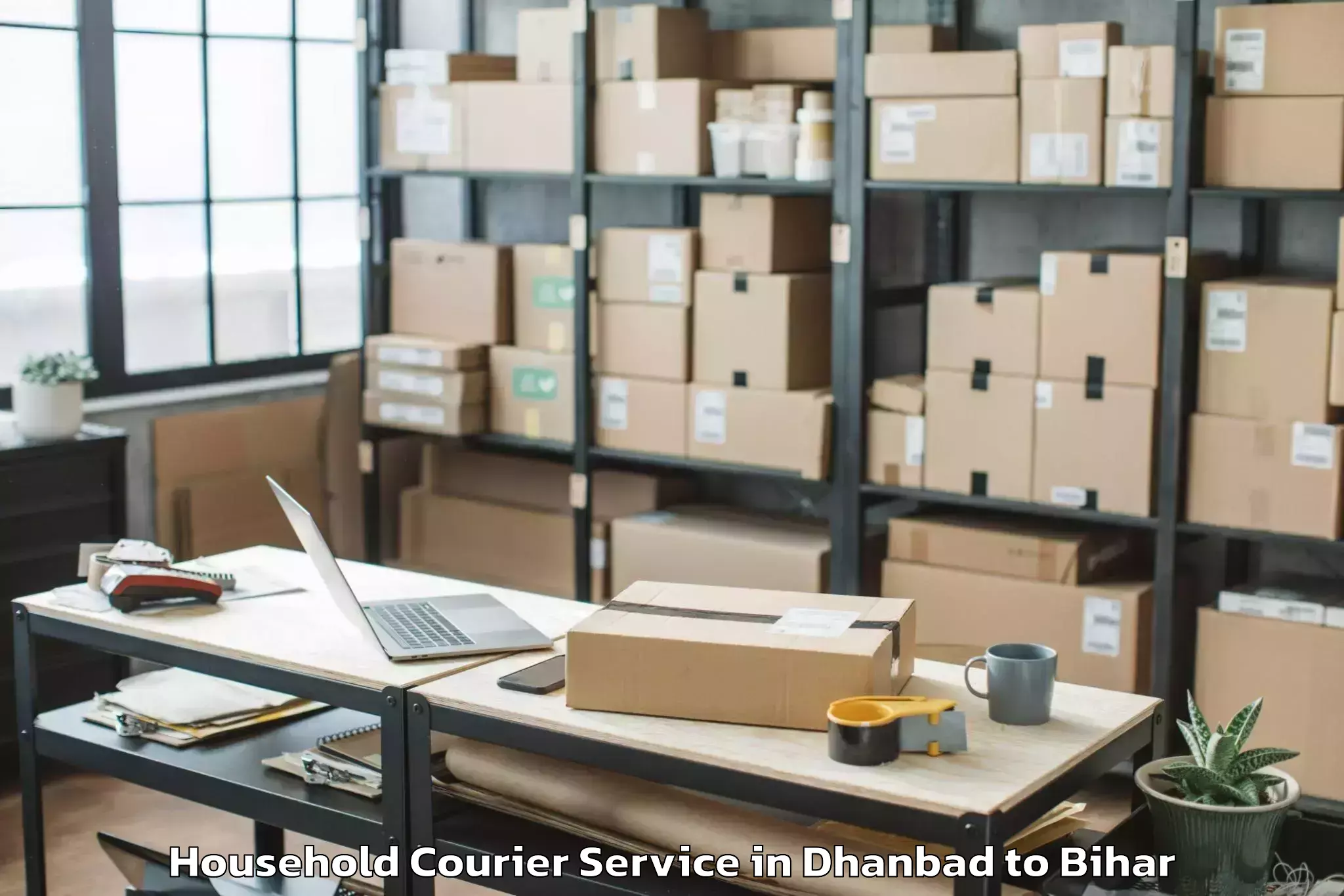 Reliable Dhanbad to Lauria Nandangarh Household Courier